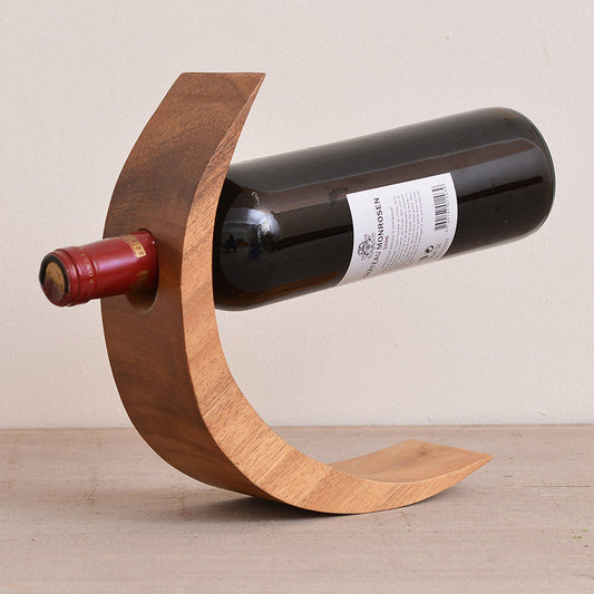 Balance wine bottle holder made of solid bamboo