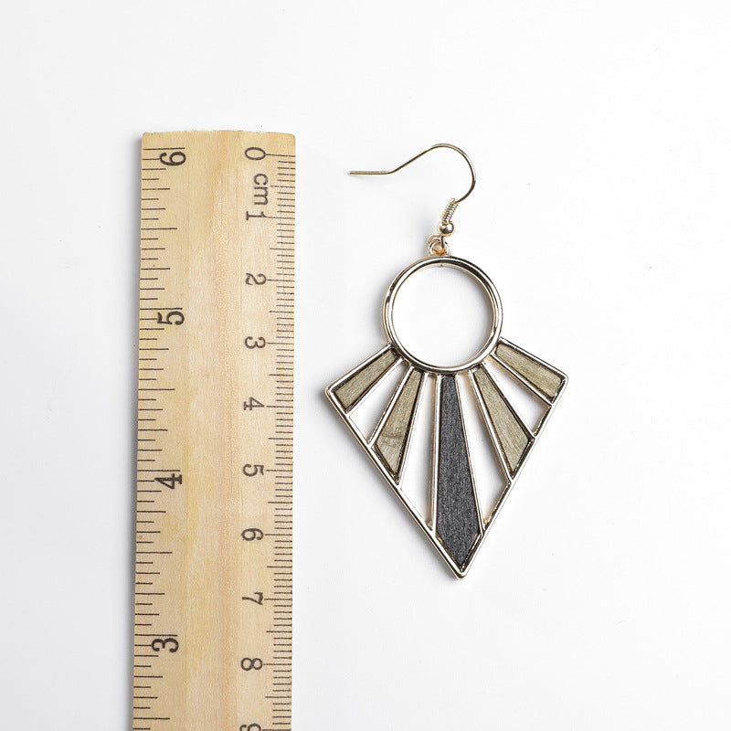 Geometric earring made of colored wood